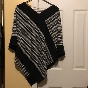 S/M poncho new with tags.
